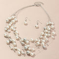 Multilayer pearl necklace pendant and pearl earrings
